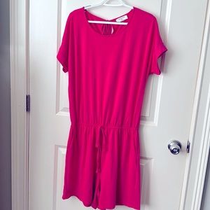 3 short rompers in black, tan and hot pink.